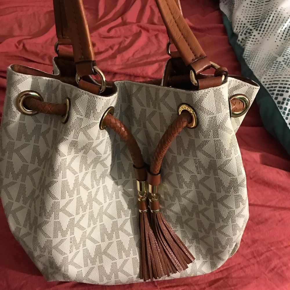 Michael Kors- stained inside corner bag